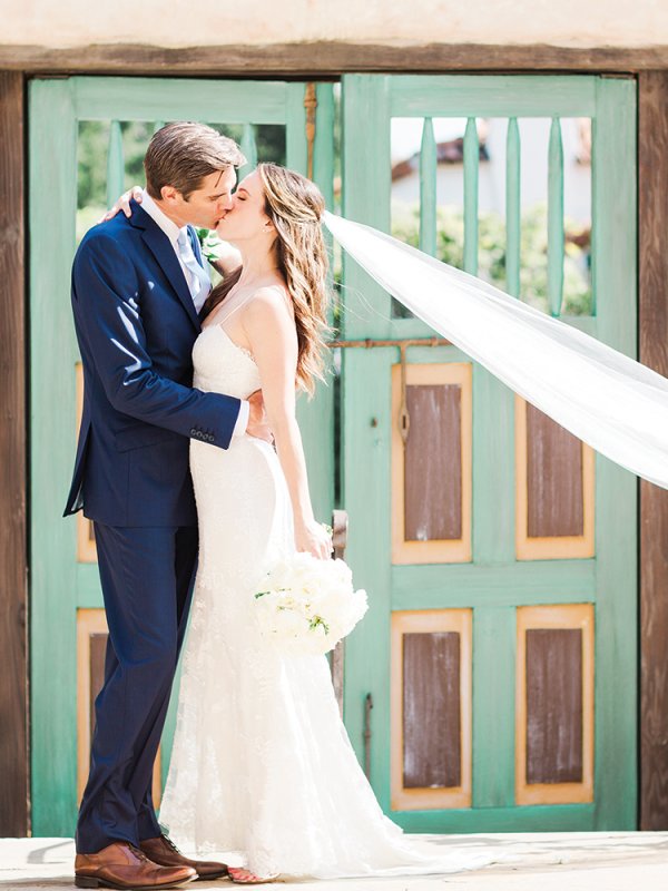 bride and groom kissing